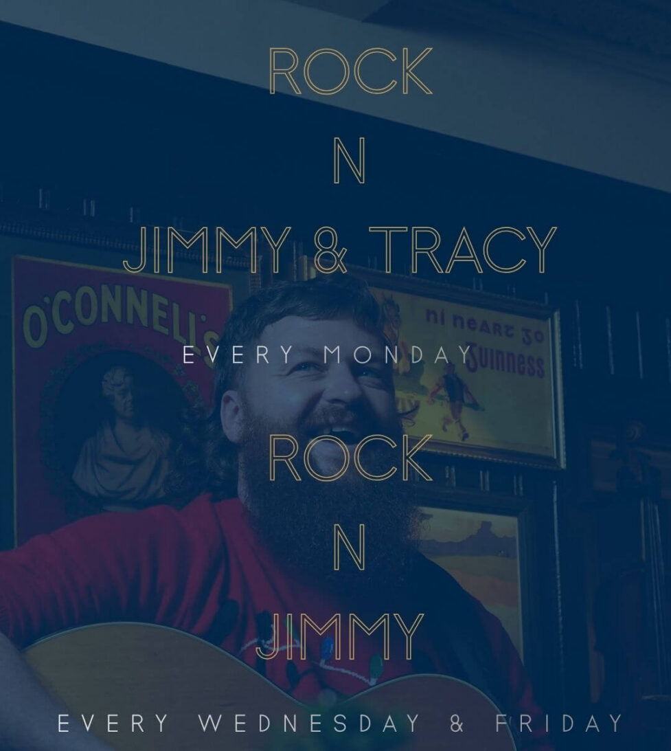 Cozy hotel bar with live music evenings featuring a guitarist, inviting ambiance, perfect for relaxing nights.